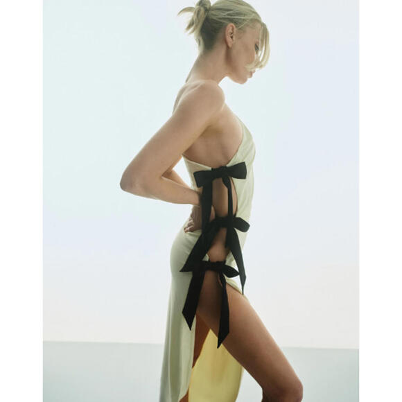 HELSA Dresses & Skirts - Helsa The Seline Dress butter yellow asymmetrical open-sided bow-tie XS NWT $369